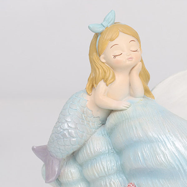 Cute_mermaid_on_seashell_3_600x.jpg